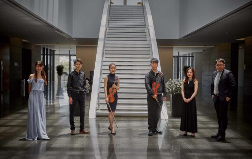 Six of the finest young classical musicians in the city stand in the Macao Cultural Centre lobby