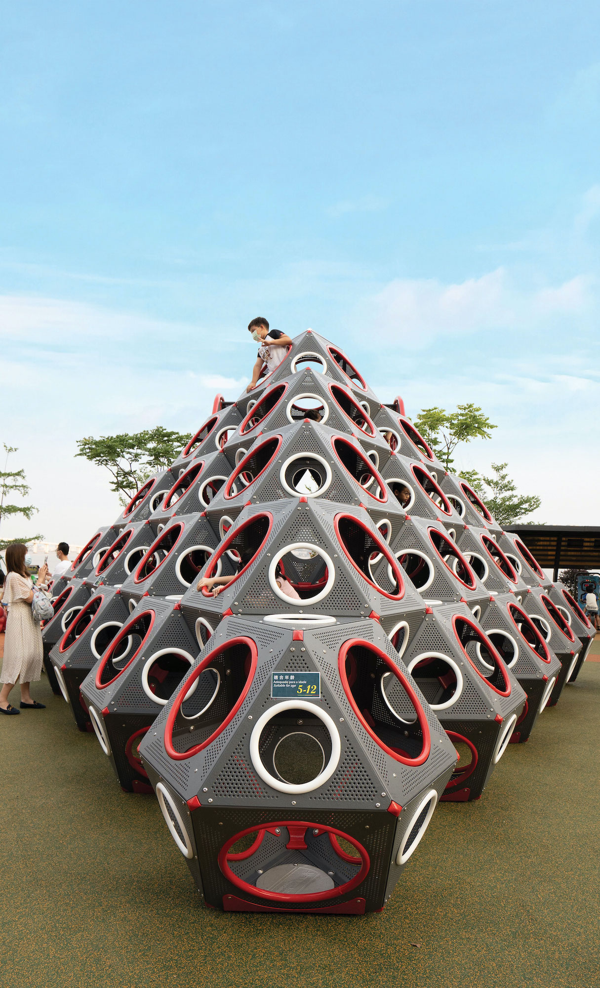 Children enjoying play facilities at the park