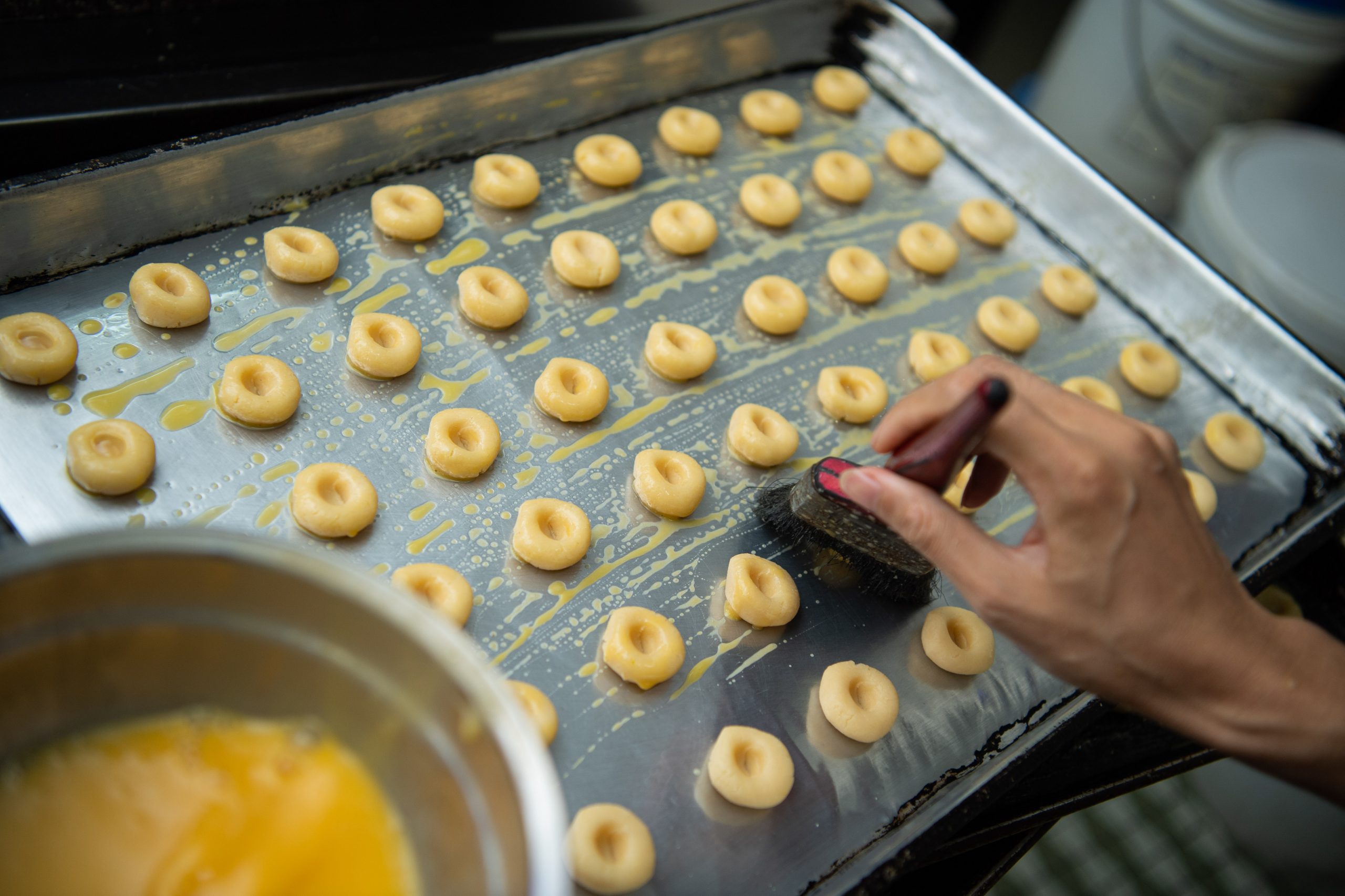 Tedmond Kou making one of Fong Kei’s signature walnut cookies