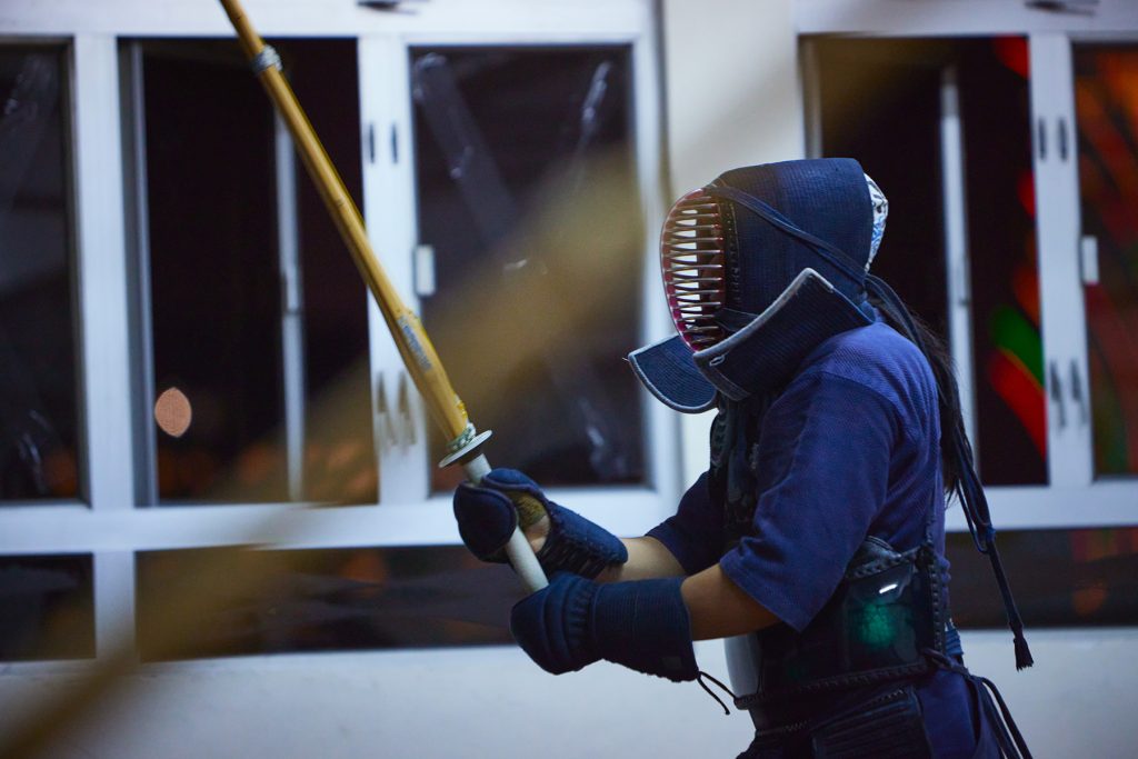 A student geared up with the Bōgu (armour), and kendōgu (kendo equipment) mid-practice