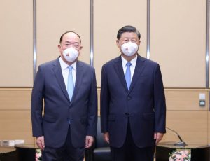 President Xi Jinping (right) and Chief Executive Ho Iat Seng