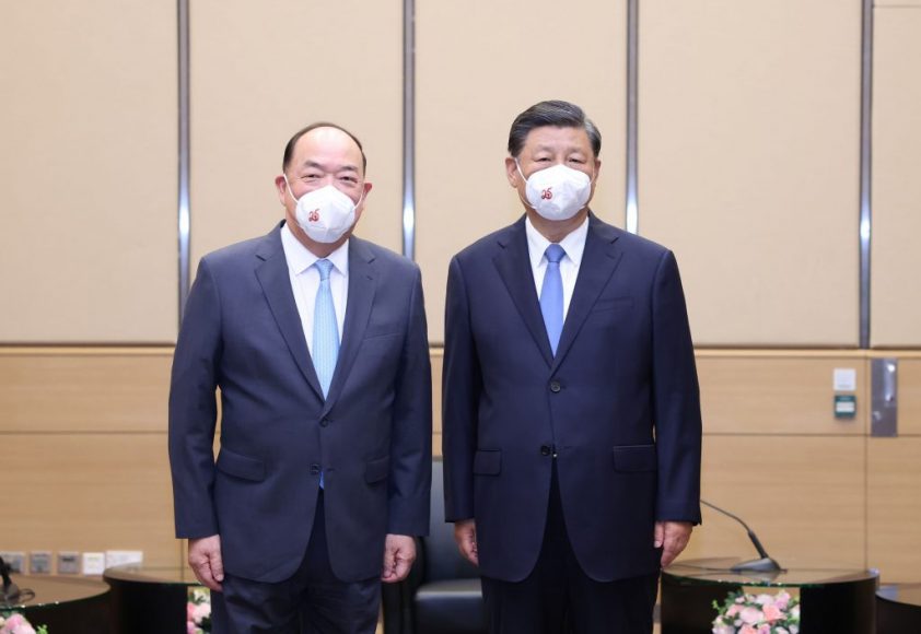 President Xi Jinping (right) and Chief Executive Ho Iat Seng