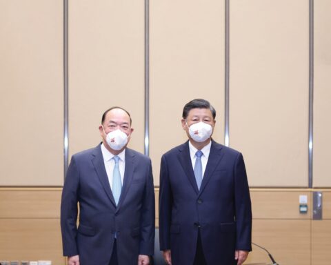 President Xi Jinping (right) and Chief Executive Ho Iat Seng