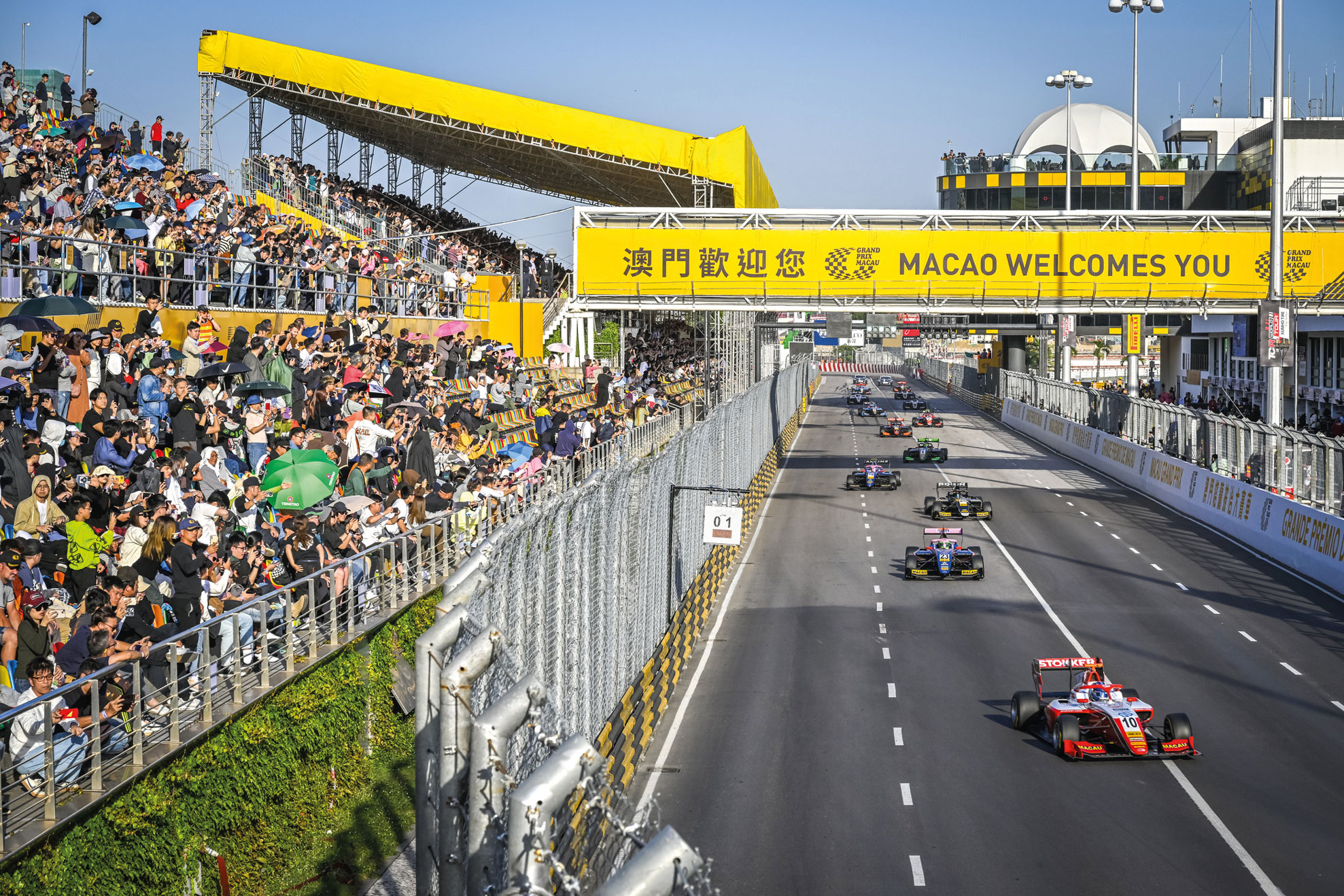 Spectators on the Grand Stand cheering on during the Formula 4 race