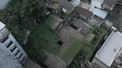 An aerial view shows how the once-proud Chio Family Mansion expanded over time