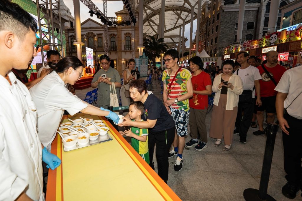 Vendors serving guests at the International Cities of Gastronomy Fest