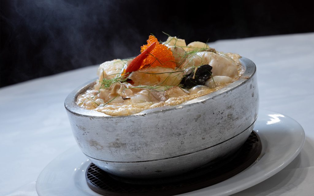 Their signature creamy fish soup drew special praise from the Michelin Guide