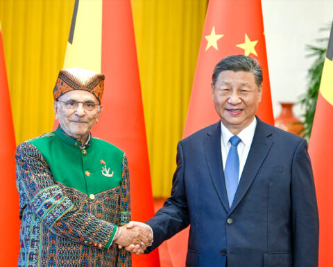 Chinese President Xi Jinping shakes hands with his Timorese President counterpart, José Ramos-Horta, during the latter’s visit to Beijing in July