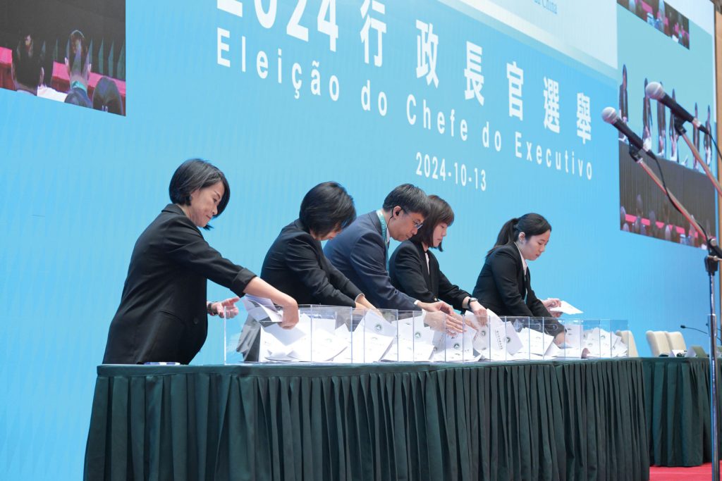 Members of the Electoral Affairs Commission count votes on election day