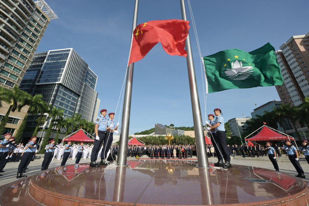 Macao hosted a ceremonial flag-raising at the Lotus Flower Square as part of its National Day celebrations, hoisting the flags of the motherland and the Macao Special Administrative Region