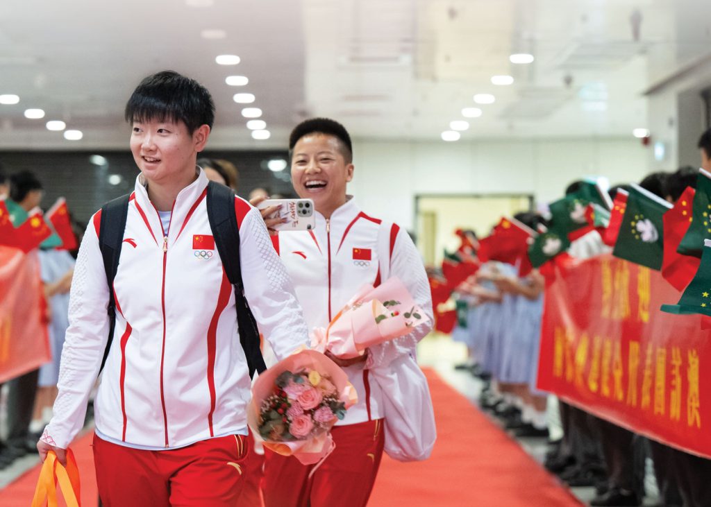 Chinese table tennis player Sun Yingsha (front) attends the welcome ceremony for the delegation