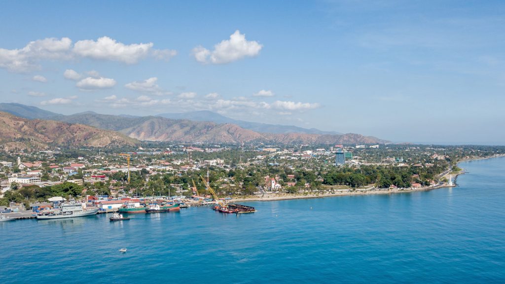 The capital of Dili sits nestled between the mountains and the pristine waters of the Ombai Strait