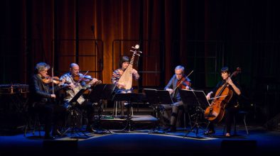 Chinese classical musician Wu Man plays her pipa alongside artists from Iran and India, in the supergroup DoosTrio