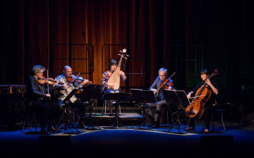 Chinese classical musician Wu Man plays her pipa alongside artists from Iran and India, in the supergroup DoosTrio