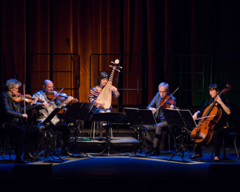 Chinese classical musician Wu Man plays her pipa alongside artists from Iran and India, in the supergroup DoosTrio