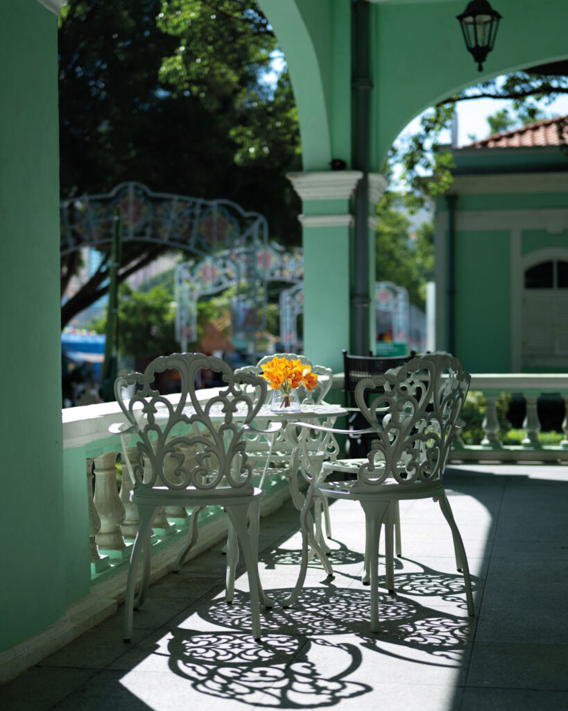 The veranda of Casa Maquista looks out on the other Taipa Houses