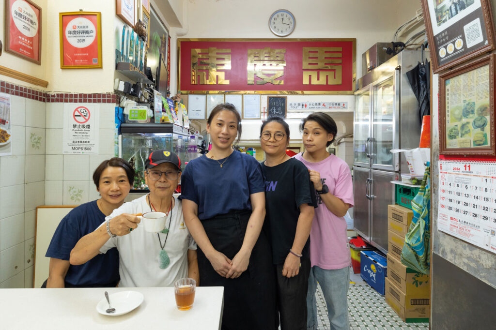 The Ma sisters with their father enjoying a cup of tea at their cha chaan teng