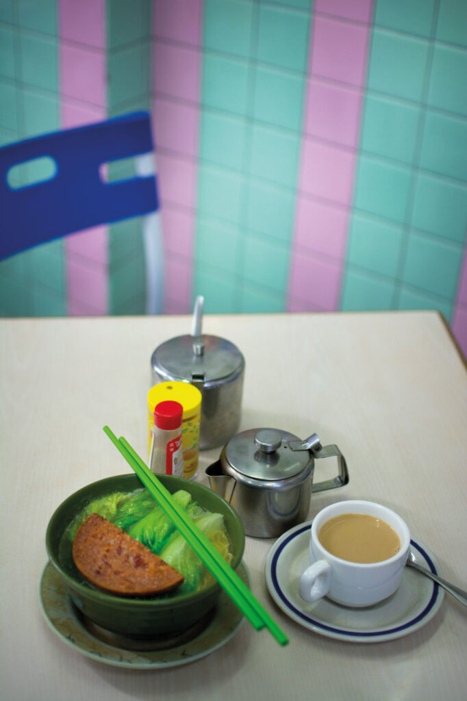 A breakfast set at Café Rosa: instant noodles and a mug of milk tea