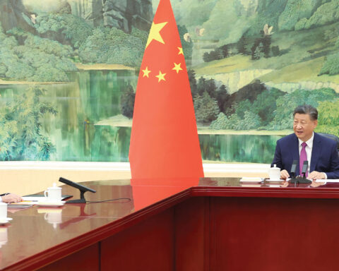 Xi (right) personally congratulated Sam on his appointment