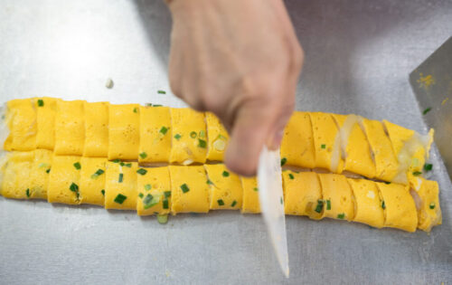 Lam’s on-the-fly recipe for egg rice rolls unexpectedly became his most popular order – earning him praise from from foodies around the world