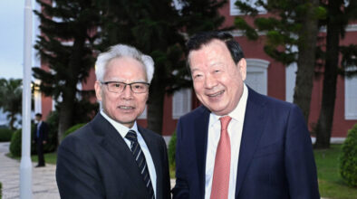 Macao Chief Executive Sam Hou Fai (left) warmly greets visiting Central Government official Xia Baolong outside Santa Sancha in May