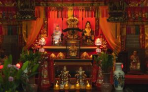 An alter dedicated to the worship of Tou Tei (the bearded figure on the left) and his consort, Tuo Tei Po An alter dedicated to the worship of Tou Tei (the bearded figure on the left) and his consort, Tuo Tei Po