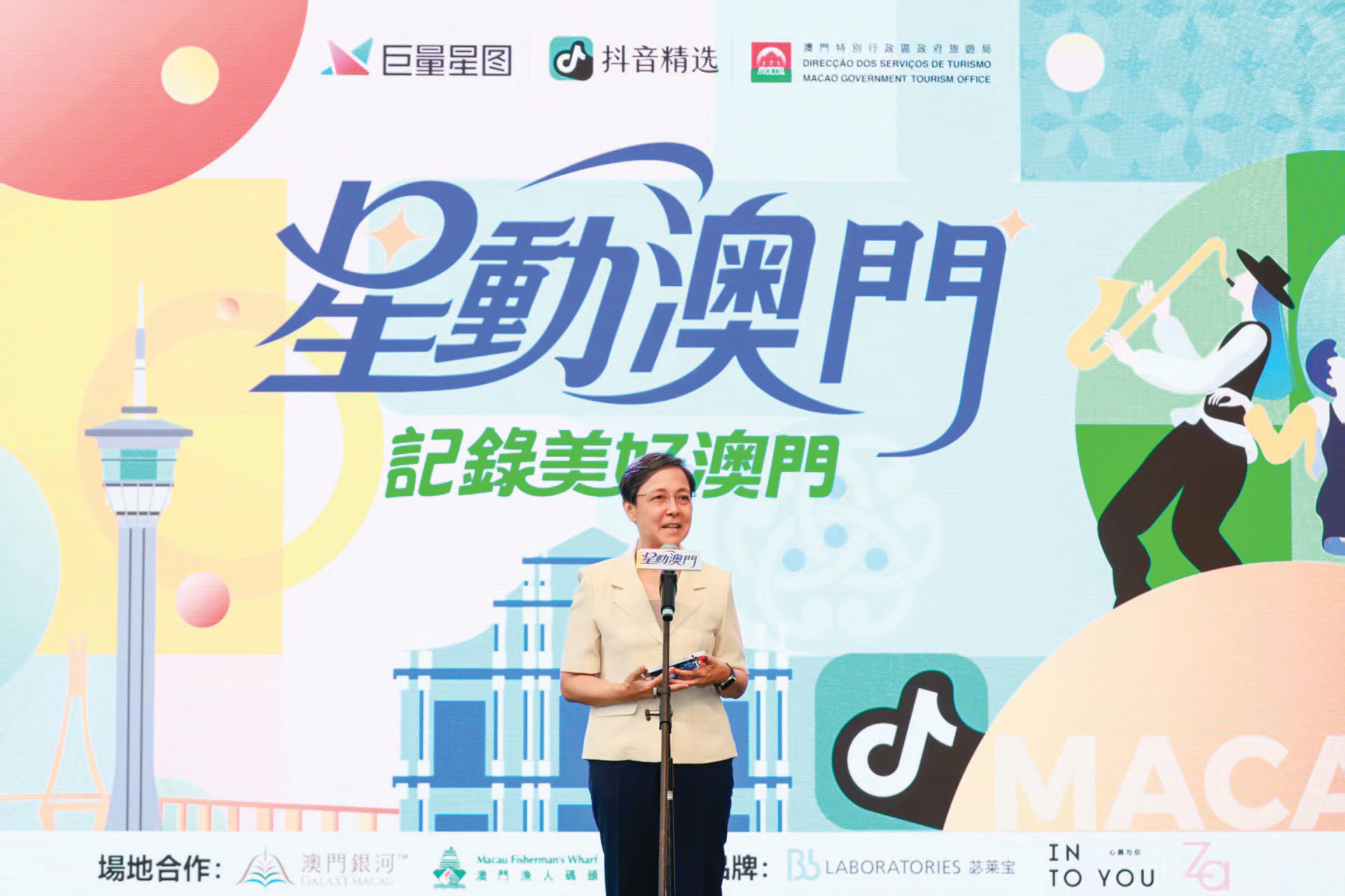 MGTO’s Maria Helena de Senna Fernandes makes a speech at “Enchanting Macao” in June