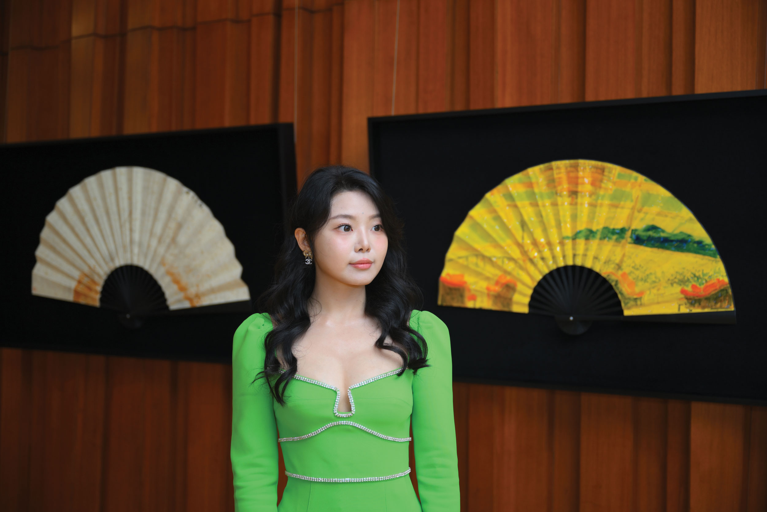 Tsang’s The Radiance of the Starry River (right) depicts some of Macao’s most iconic modern structures in strikingly vivid colour