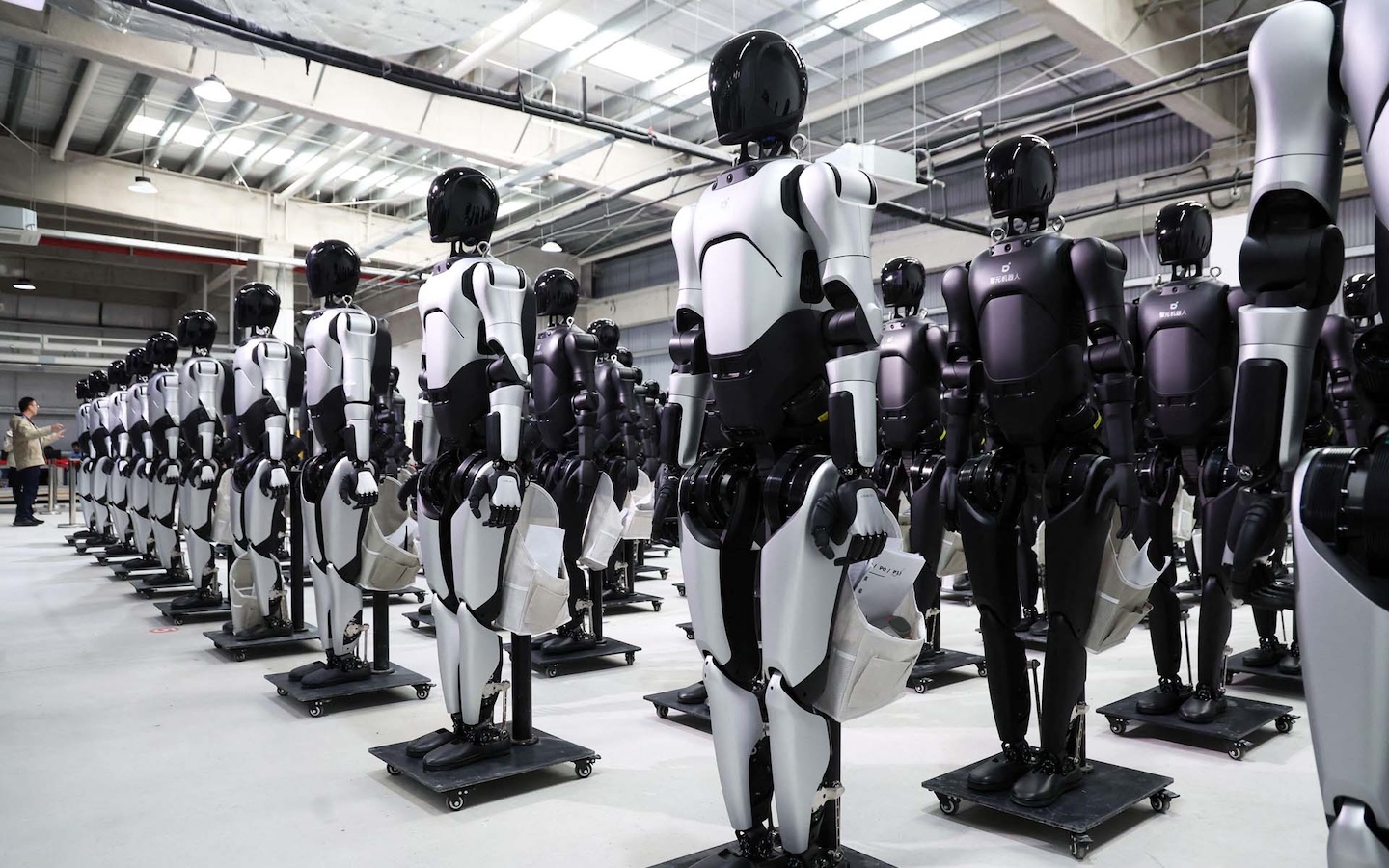 The robots are fully assembled and ready for deployment at the mass production plant, December 8, 2025.Shanghai,China.8th December 2025.AGIbot's 5,000th general-purpose embodied robot, the Lingxi X2 officially rolled off the production line on December