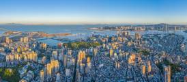 The iconic Grand Lisboa shines on the right of this vista over St Lazarus’ Parish. If you look closely, you can see the historic Guia Fortress and Lighthouse in the far centre.丨Photo by Lou Lam Kit, courtesy of the Government Information Bureau