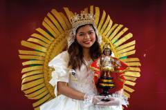 The queen of the Debutantes de Macau dance troupe poses for a portrait before the start of the Sinulog procession