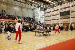 Gold medallists Ma Long and Xu Xin demonstrate their table tennis skills with local athletes