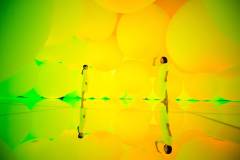 Inside Expanding Three- Dimensional Existence in Transforming Space you are surrounded by 3D spheres that constantly collide and change colour