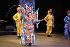 Performers from Italy’s Akragas Folk Dance Group do the tarantella and feat in the countryat the indoor closing performance of the youth dance festival on 25 July