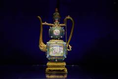 A painted enamel gold teapot with landscapes and figures from the Qianlong period of the Qing dynasty, between 1736 and 1795.