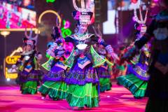 Artists in colourful flowing costumes performed during the parade