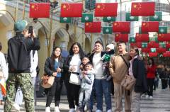 Families marked the occasion together, documenting their own place in Macao's history – and future