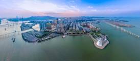 The Macau Science Centre stands out as its silver sides majestically catch the light in this magical image of the Macao peninsula’s southern shoreline.丨Photo by Lou Lam Kit, courtesy of the Government Information Bureau