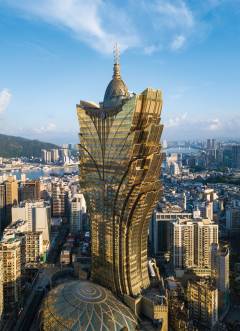 Standing tall at 258 metres, the Grand Lisboa entertainment resort was completed in 2008. It dominates the skies, whether photographed from above or below.