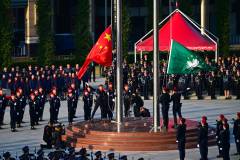 The solemn atmosphere around the ceremonial flag-raising gave way to a more lively mood felt across the rest of the anniversary